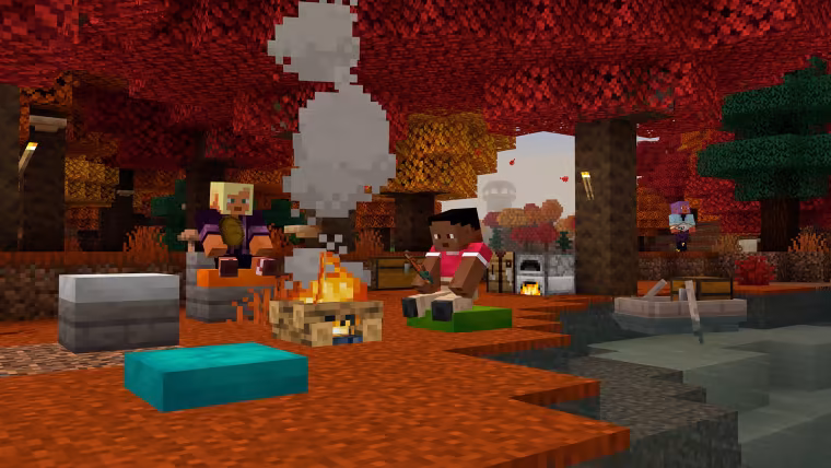 Joueurs assis sur des coussins autour d'un feu de camp dans Minecraft