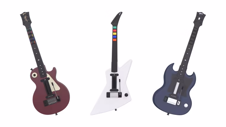 Les trois manettes guitares CRKD sous licence Gibson pour Stage Tour : Les Paul Oxblood, Explorer et SG Midnight Blue